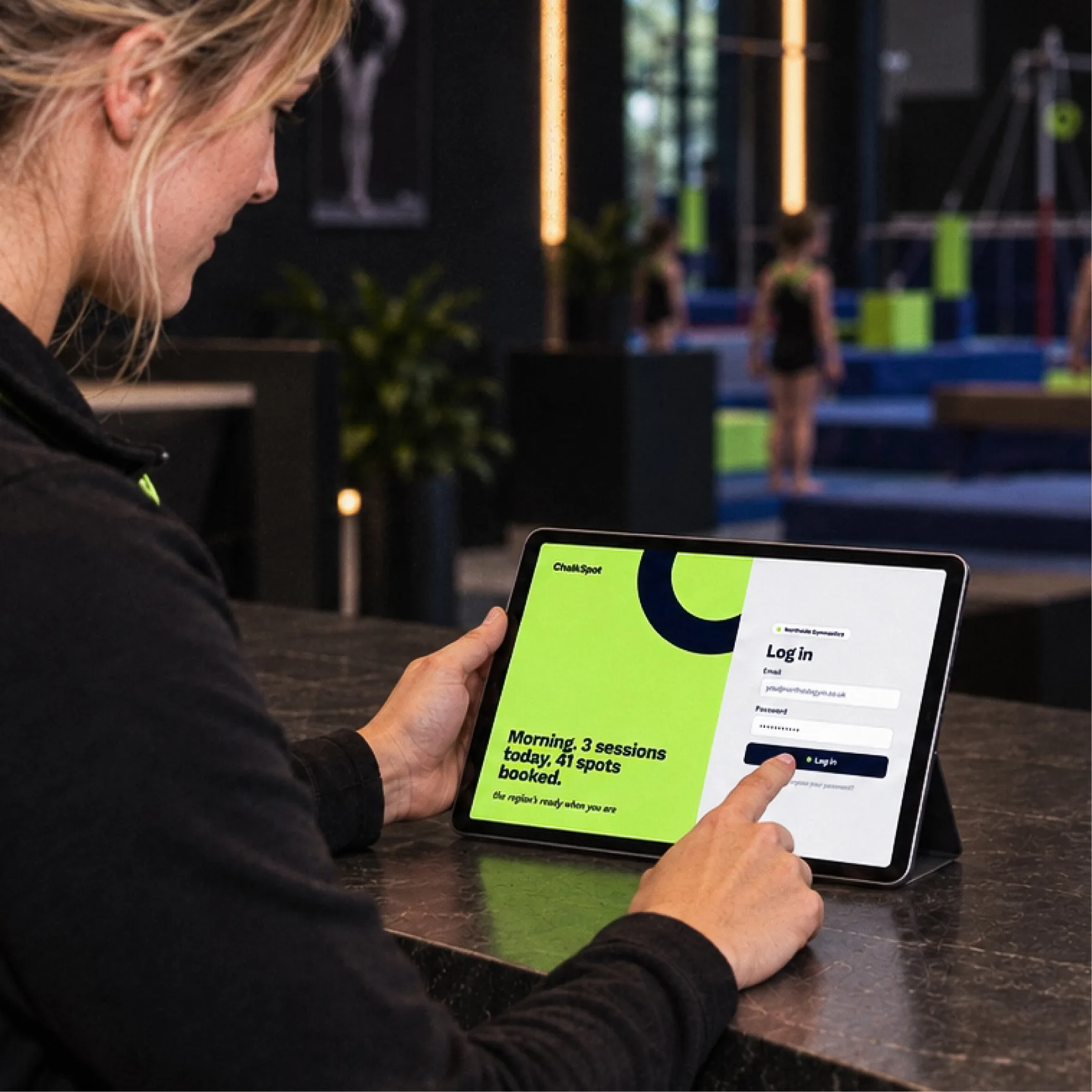A coach signing in to ChalkSpot on a tablet
