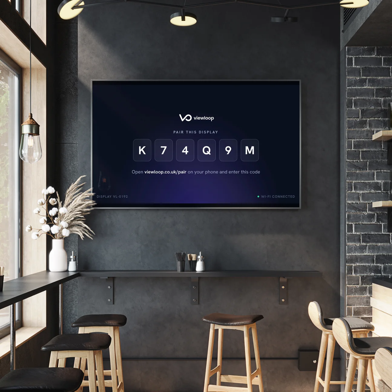 A ViewLoop screen running in a bar