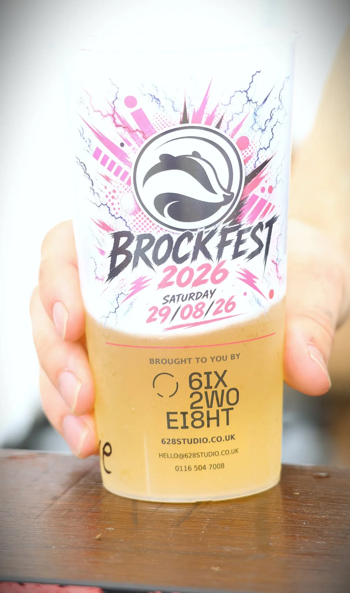 A BrockFest 2026 pint cup branded with the 628 Studio logo